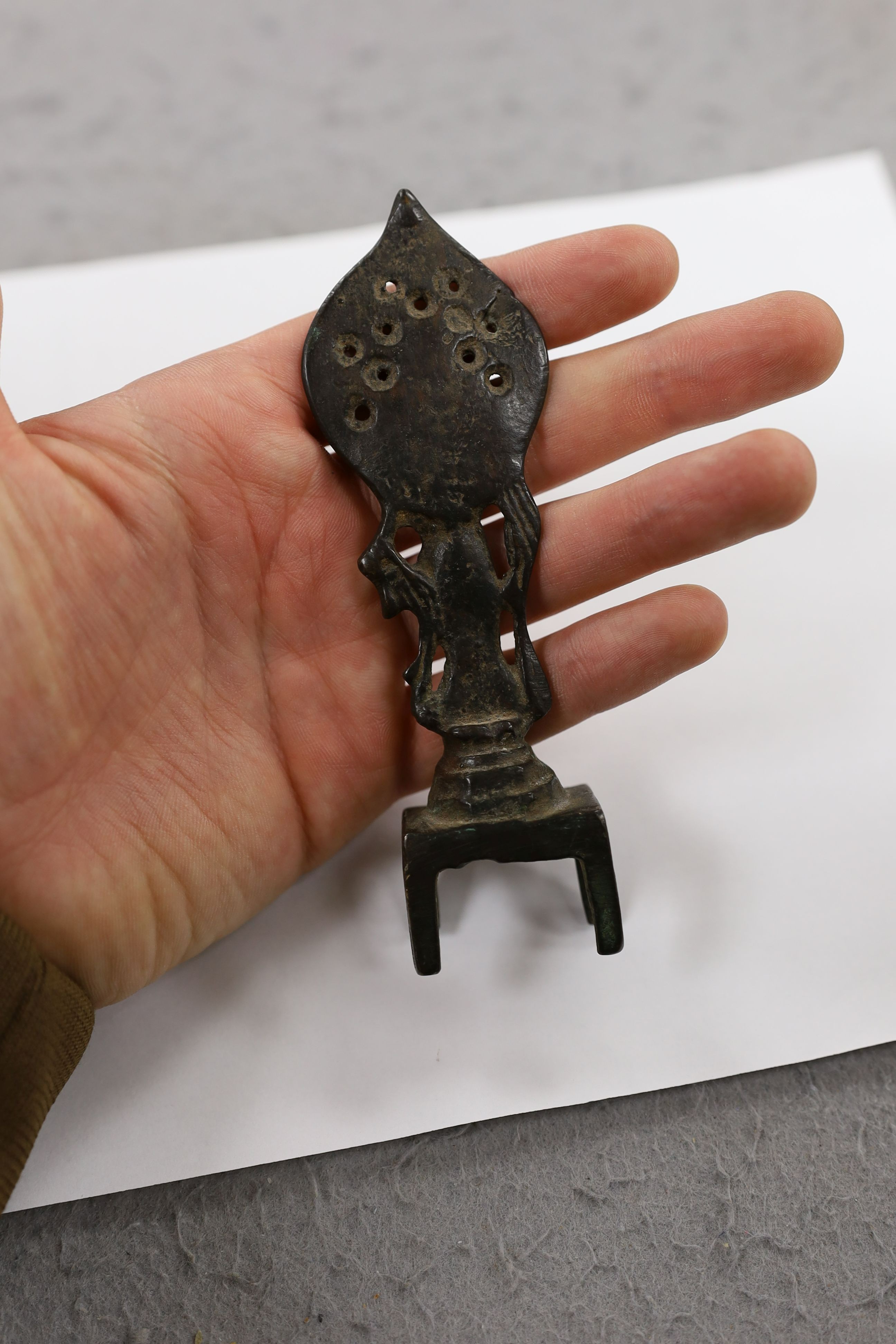 Five Chinese or Tibetan bronze figures or Buddhist implements, tallest 13cms high